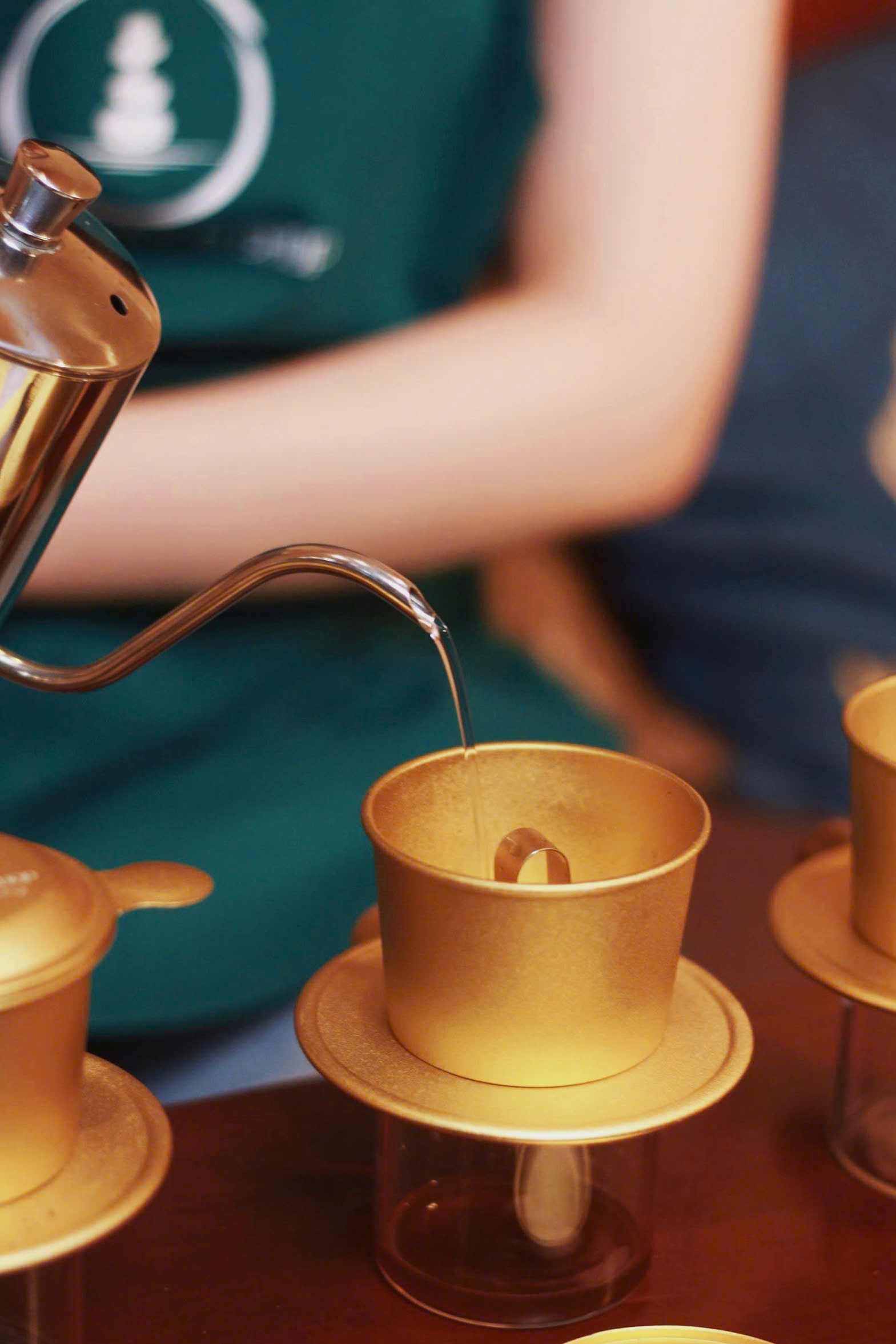 Step 2: Pouring water into a Vietnamese phin